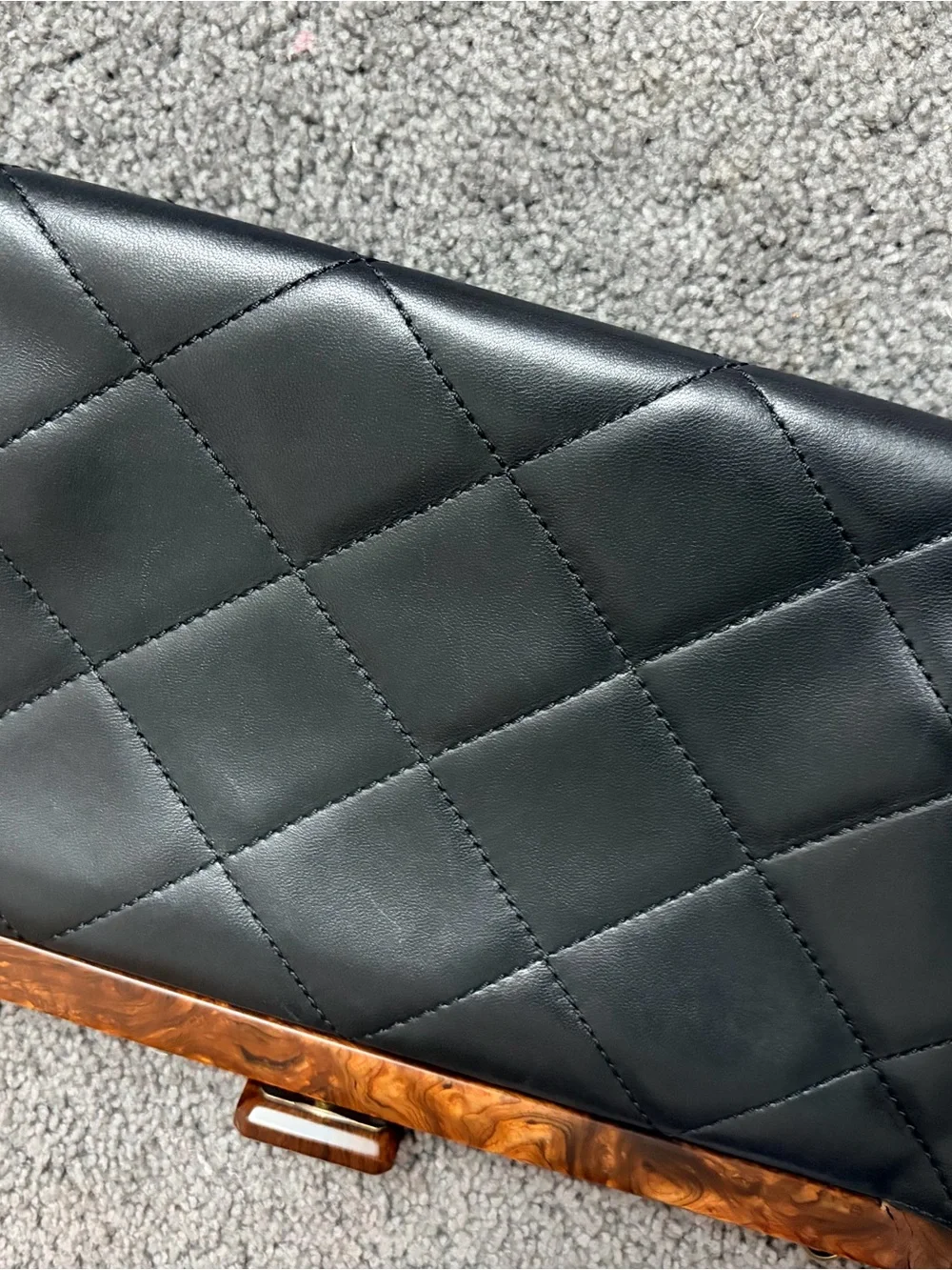 CHANEL Black Quilted Leather Shoulder Bag with Brown Chain